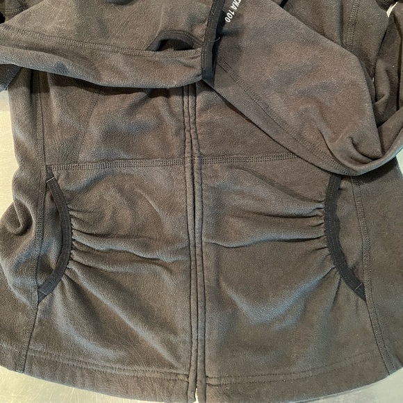 North face Small, embossed pattern, black fleece, front pockets with hood. - Picture 3 of 15